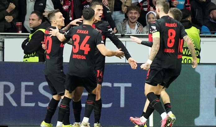 Leverkusen's Patrik Schick, 3rd from left, celebrates after scoring his side's second goal during the Europa League round of sixteen, second leg, soccer match between Bayer Leverkusen and Qarabag FK at the BayArena in Leverkusen, Germany, Thursday, March 14, 2024.